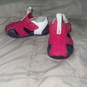 Pink Nike sandals